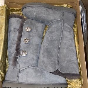 Size 6 bailey button UGGs with swavoraki crystals